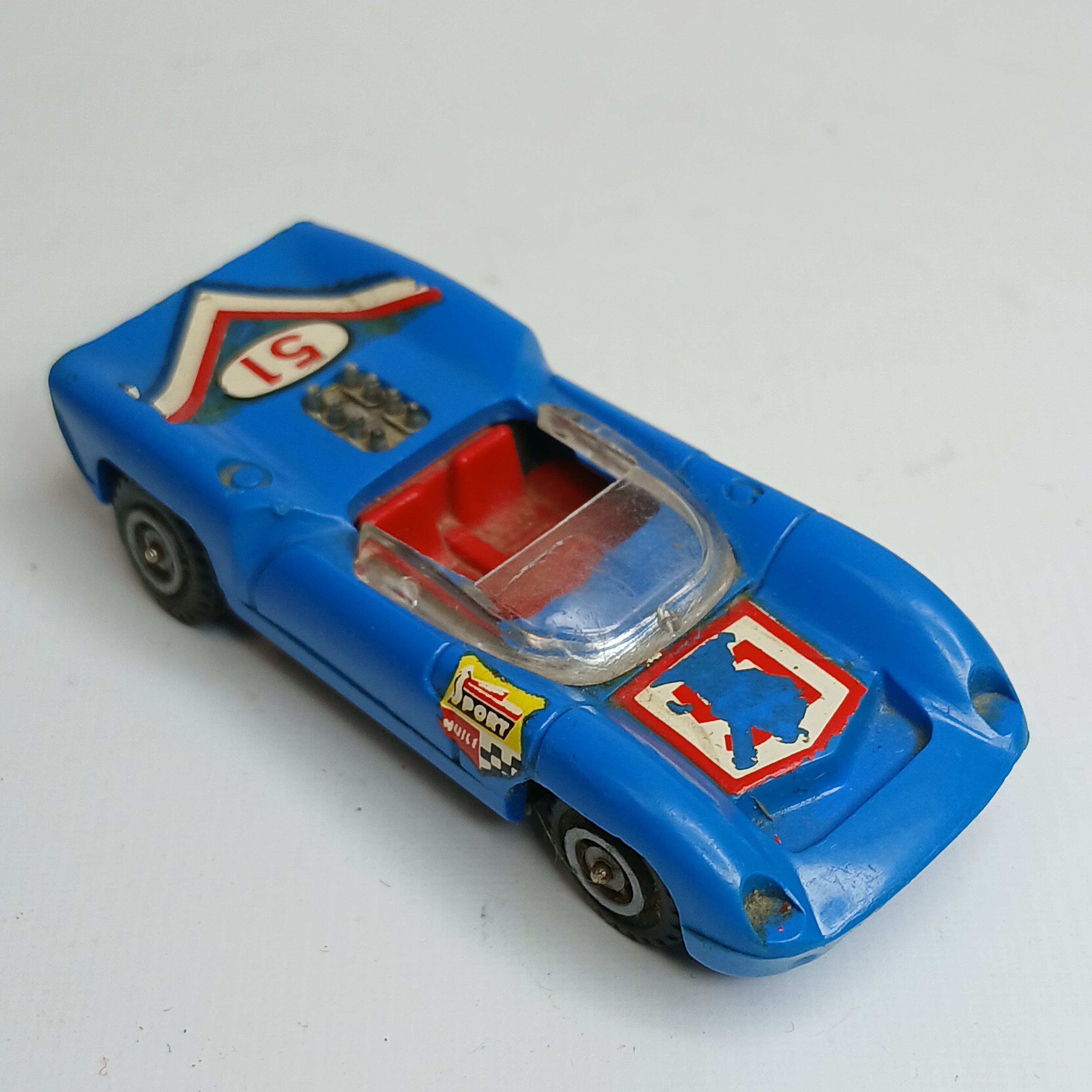 Voir photo 2 de Miniature CHAMPION - Lola T-70 (années 1960/70).Made in France - Echelle 1/64ème. Miniature CHAMPION - Lola T-70 (années 1960/70).Made in France - Echelle 1/64ème. État correct - Vue 2 -